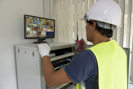 Security Camera Technician Checking Installation